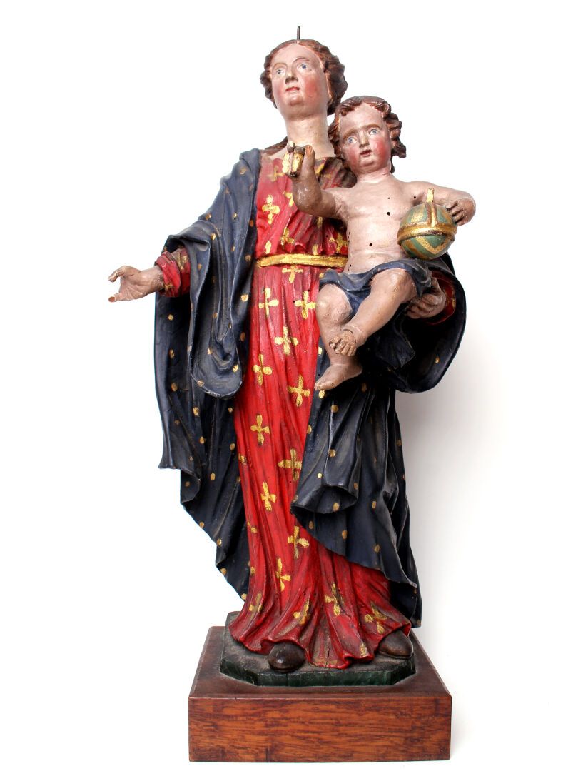 Null 19世纪初的法国学校

木雕的圣母和儿童，多色圆雕。

高度50厘米

(事故)