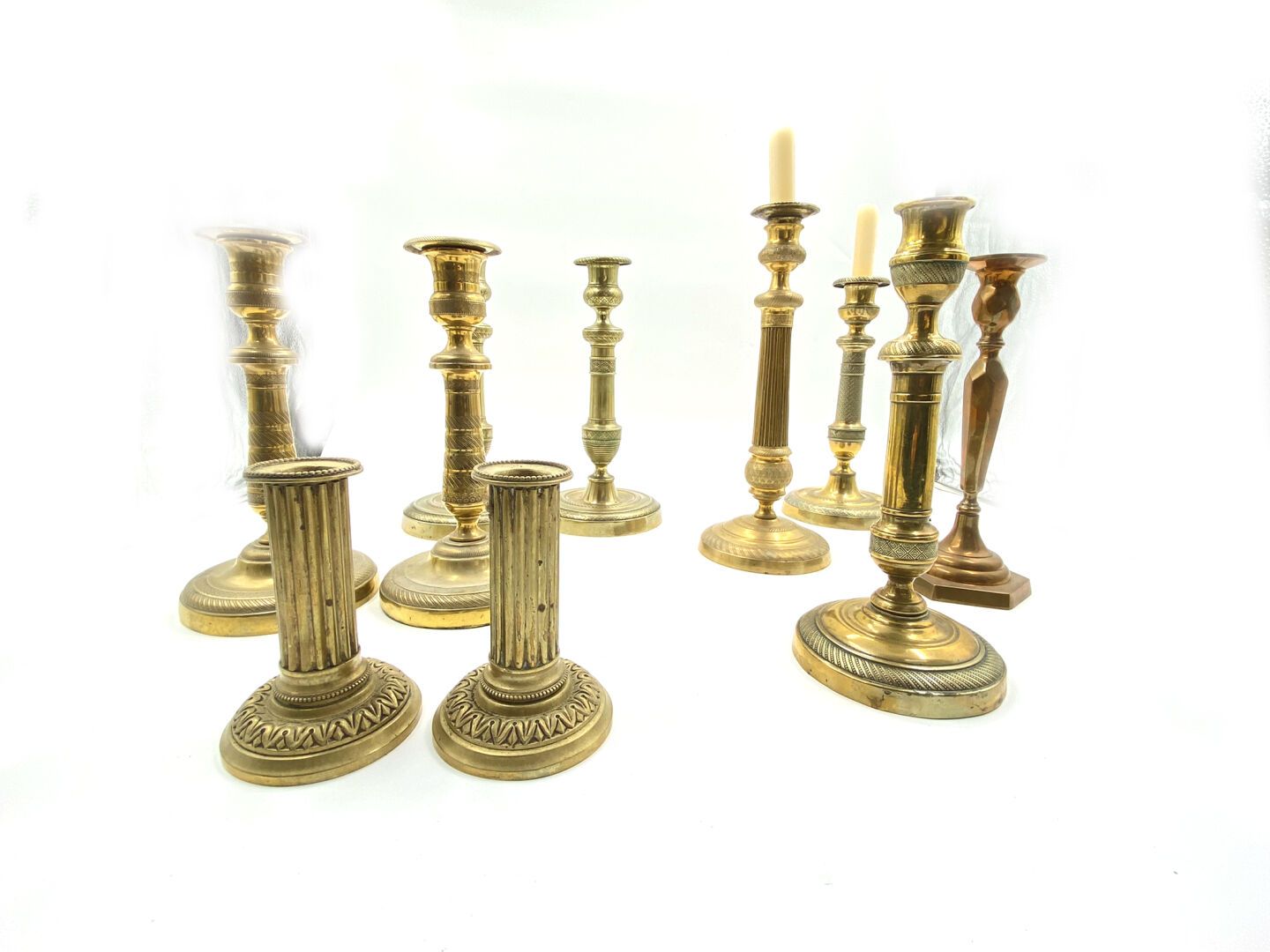 Null Set of three pairs of candlesticks in gilded brass with chased decoration o&hellip;