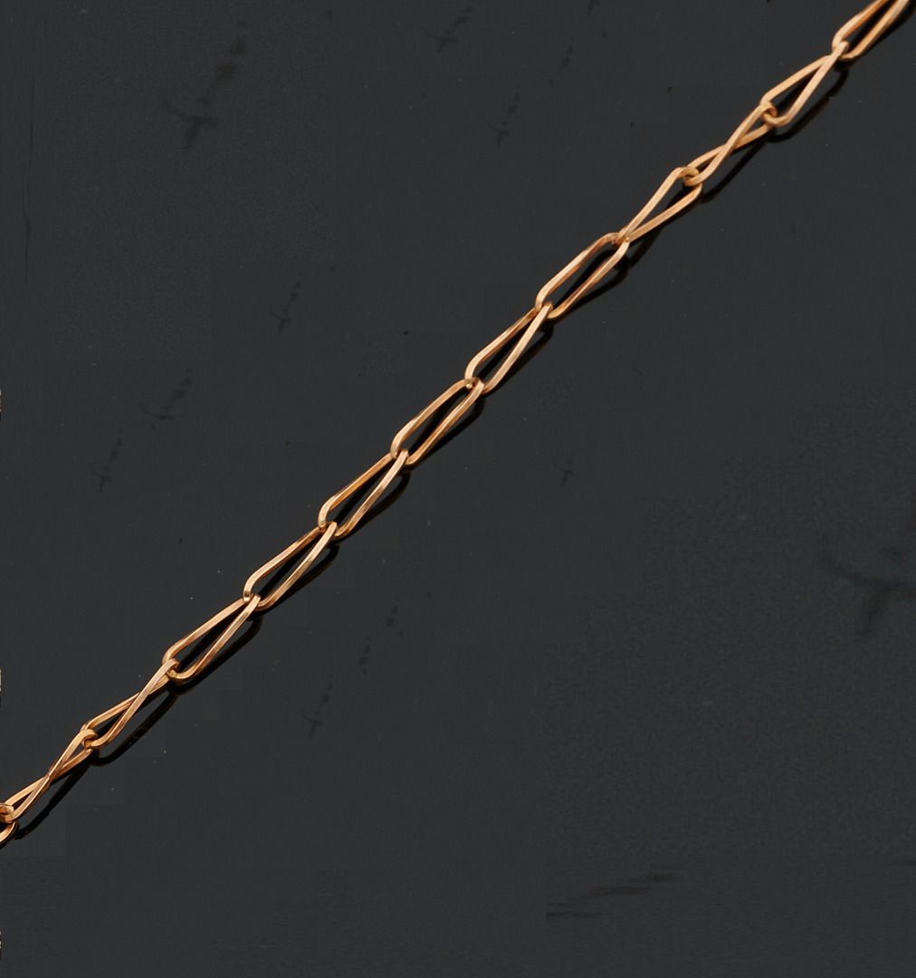 Null 750千分之一黄金项链，长条形和镂空的链节。
长度：60,5 cm
毛重 : 16,4 g