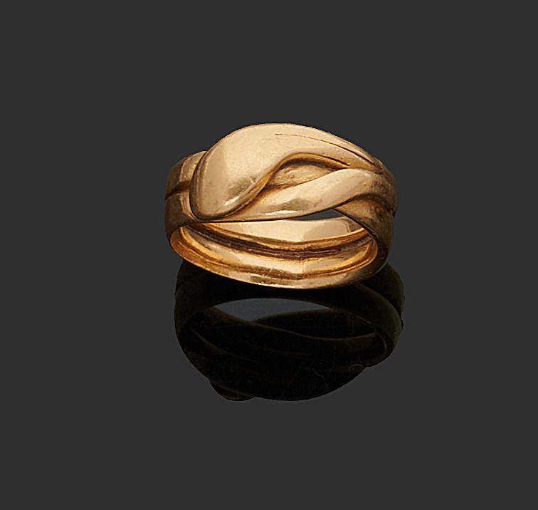 Null 黄金戒指，千分之七十五，代表一条卷起的蛇。
(穿)。
转指：58
毛重 : 13,7 g