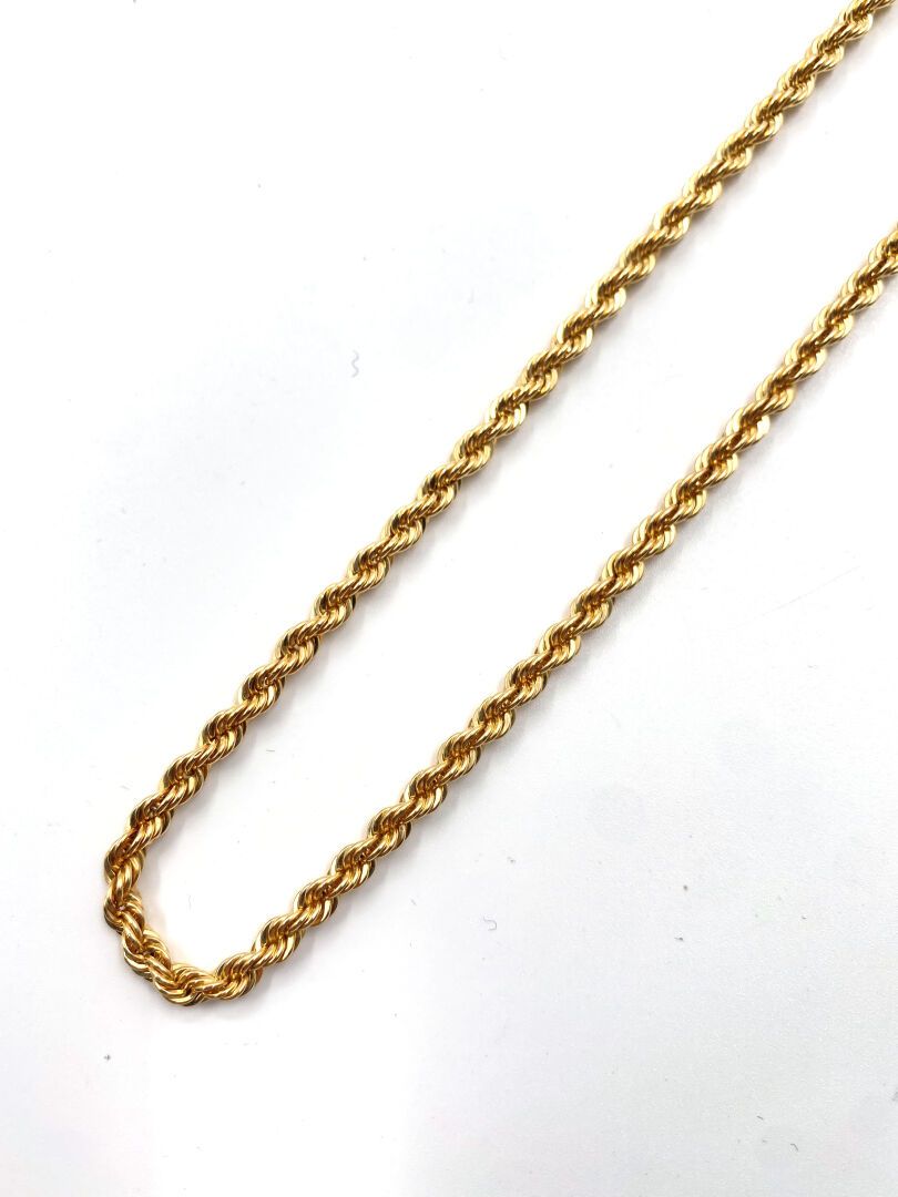 Null NECKLACE articulated in yellow gold 750 thousandths appearing a twist.
Leng&hellip;