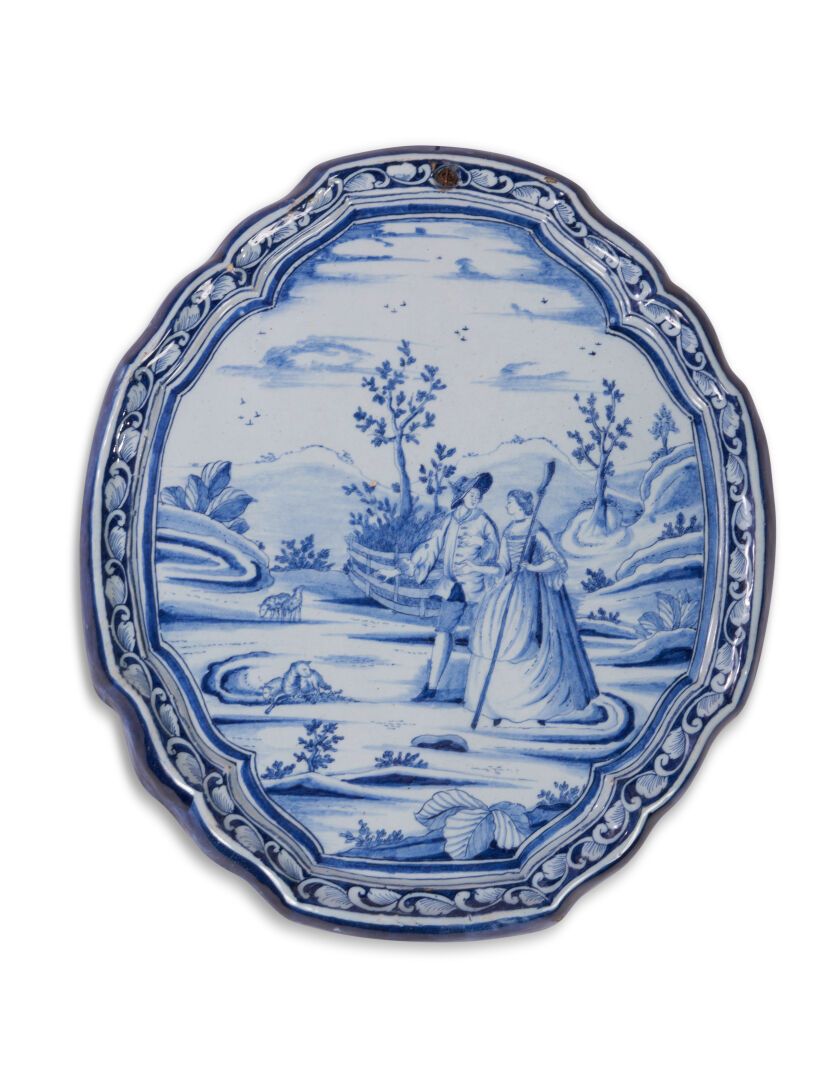 Null Delft
Plaque ovale à bord contourné en faïence à décor en camaïeu bleu d'un&hellip;