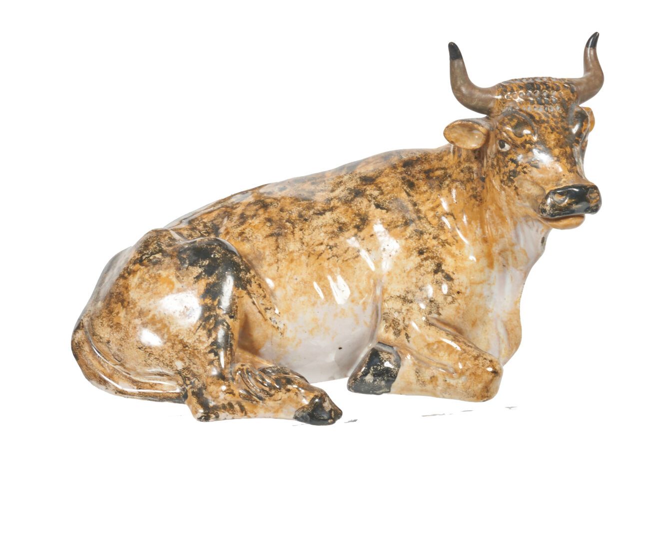 Null Arnhem
Statuette de vache couchée en faïence à décor polychrome au naturel.&hellip;