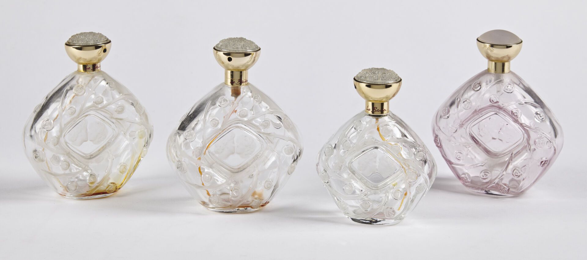 Null CRISTAL LALIQUE

Suite de quatre flacons de parfum modèle « Le Baiser », 19&hellip;