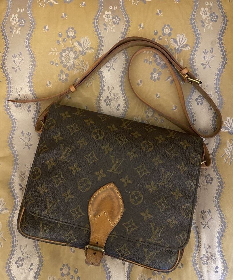 Null LOUIS VUITTON
Cartouchière bag in monogrammed coated canvas and natural lea&hellip;