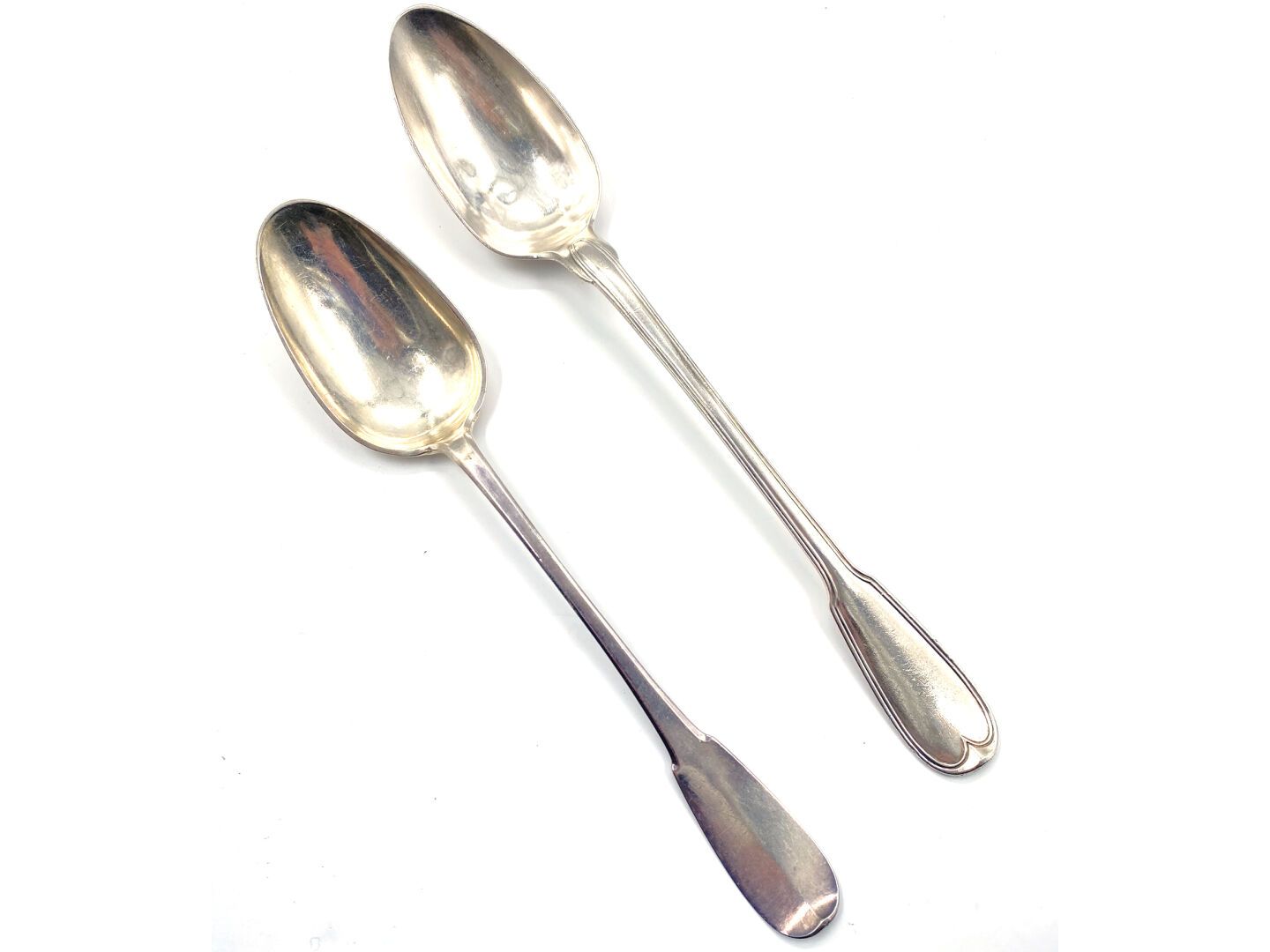 Null Two silver stewing spoons, one model filets stamped with the coat of arms o&hellip;