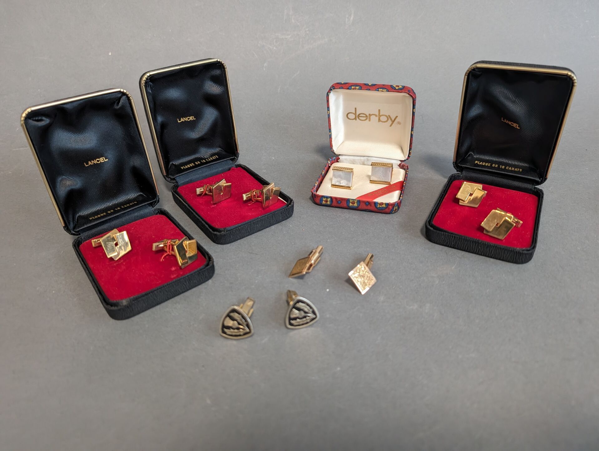 Null 5 Pairs of gold-plated cufflinks including LANCEL