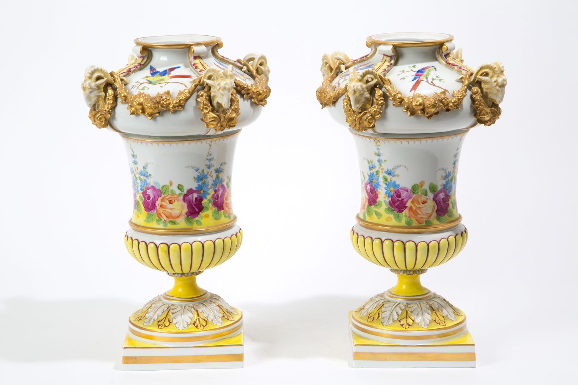 Pair of potiches Pair of painted and gilded porcelain potiches with ram's head h&hellip;