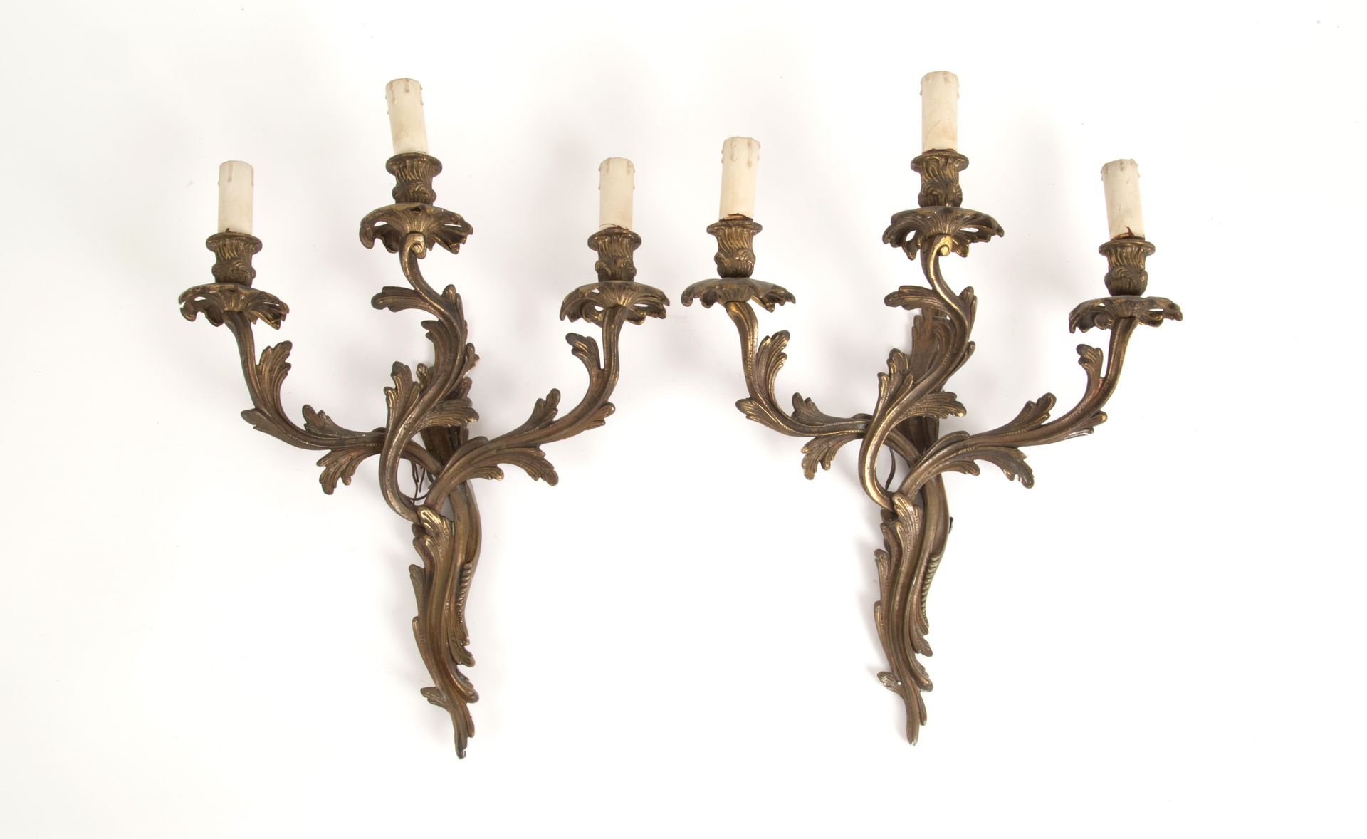 Pair of three-flame wall lights Pair of three-flame bronze wall sconces. Early 2&hellip;