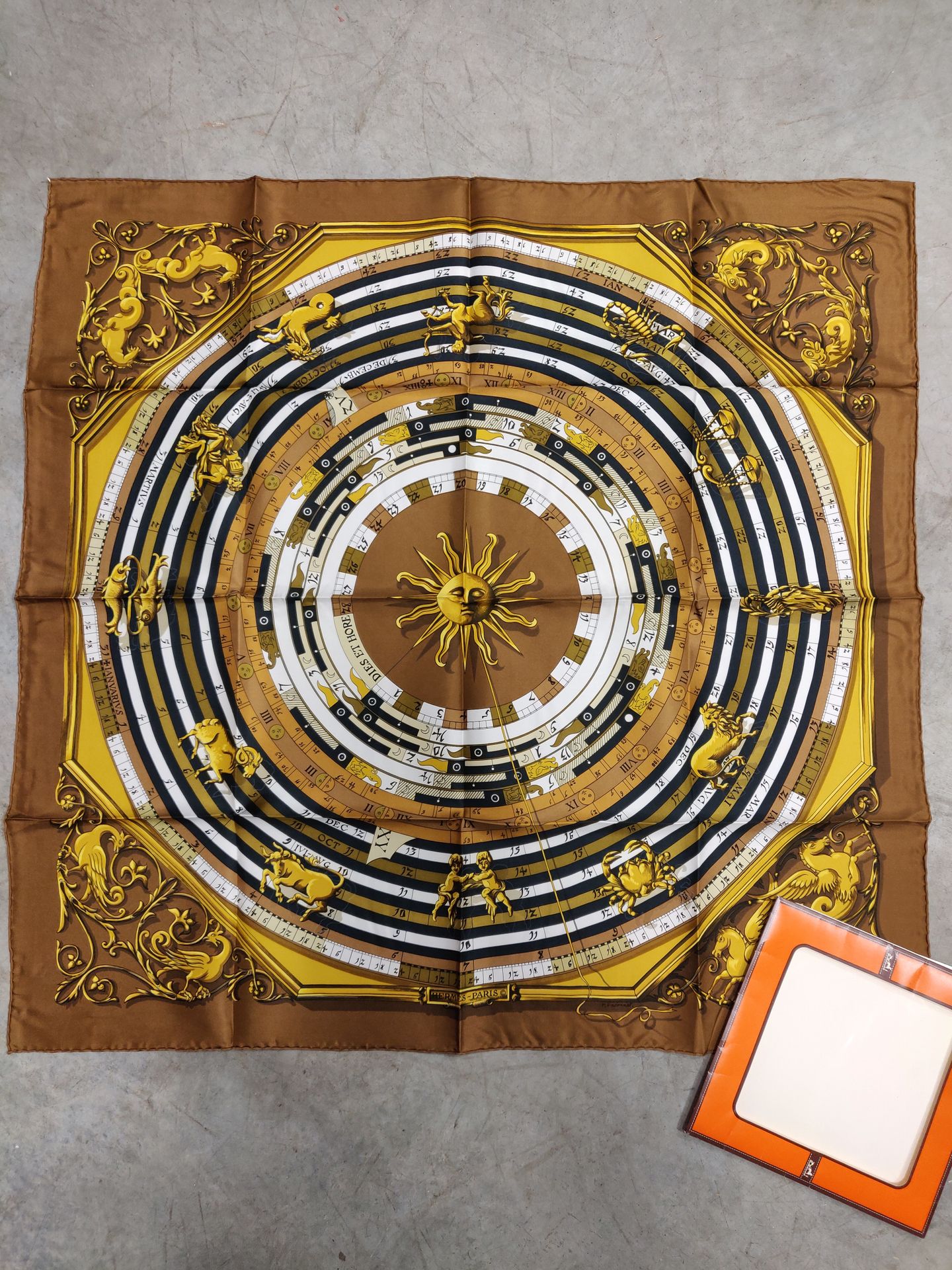 Null HERMES PARIS. Square silk scarf decorated with the signs of the zodiac "Die&hellip;