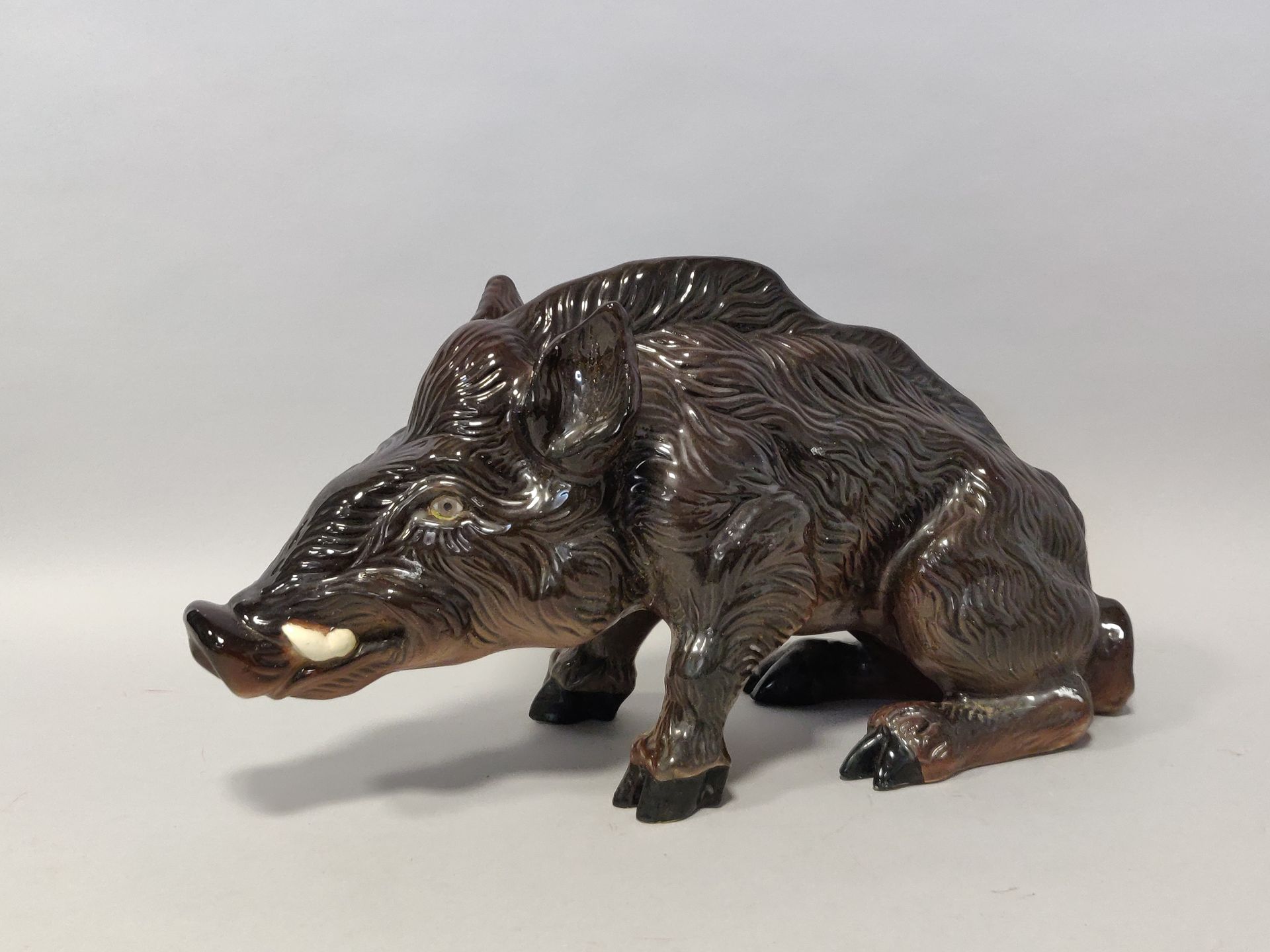 Null BAVENT. Subject in brown glazed terracotta representing a boar. The eyes in&hellip;