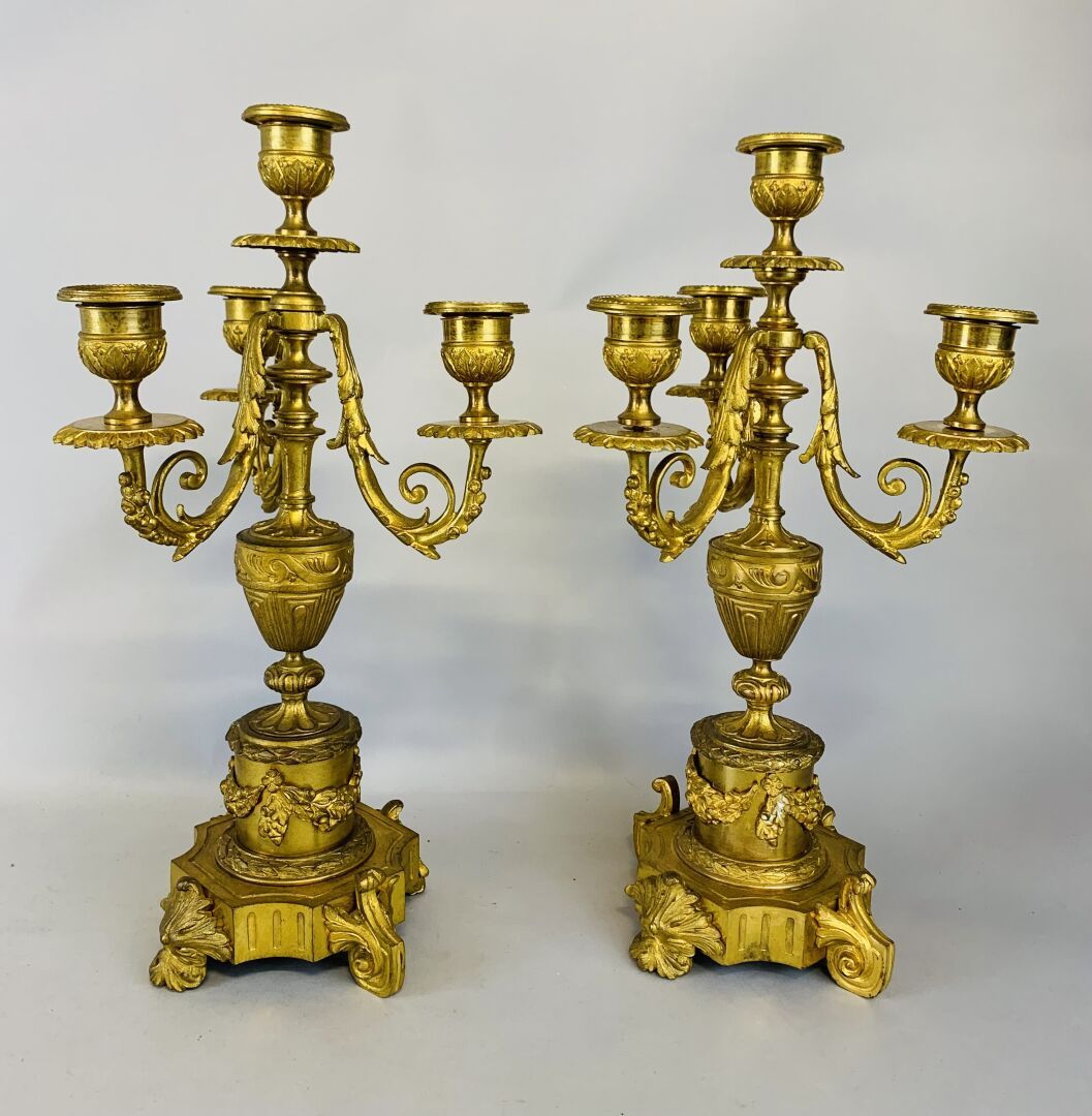 Null Pair of CANDELABRES in chased and gilded bronze with three arms of foliage &hellip;