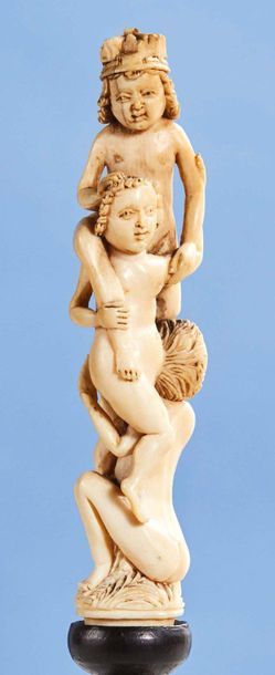 Null Handle of a finely carved ivory knife or fork depicting three child acrobat&hellip;