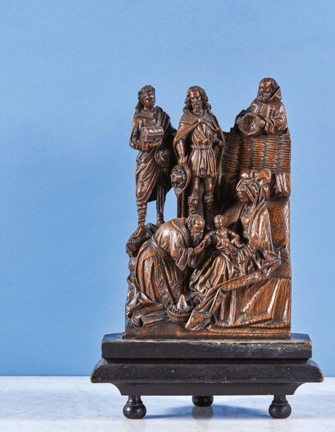 Null The Adoration of the Magi in carved oak, part of an altarpiece. In the fore&hellip;