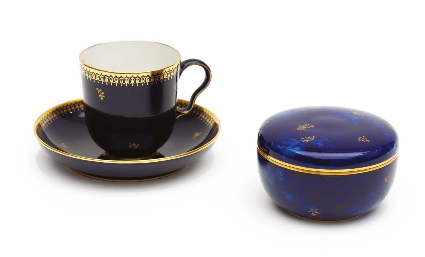 SÈVRES Porcelain cups and saucers, with a blue background enhanced by a gold fri&hellip;