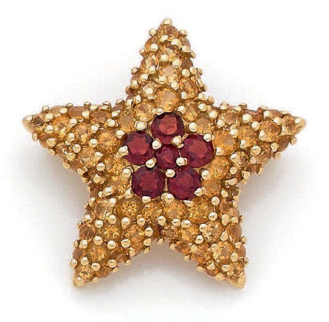 FRED (attribué à). 
18K (750) yellow gold brooch featuring a star paved with yel&hellip;
