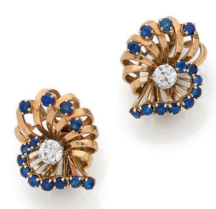BOUCHERON. 
A pair of 18K (750) gold wire ear clips depicting a spray punctuated&hellip;
