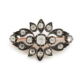 Null Silver brooch (800) lined with 18K (750) gold, decorated with scrolls adorn&hellip;