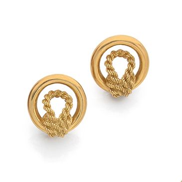 HERMES Paris Pair of 18K (750) gold round ear clips with a braided knot design.
&hellip;