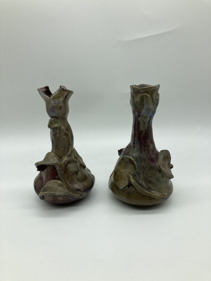 Null Alfred RENAULEAU (1854-1930)

Two ceramic vases with conical body and plant&hellip;