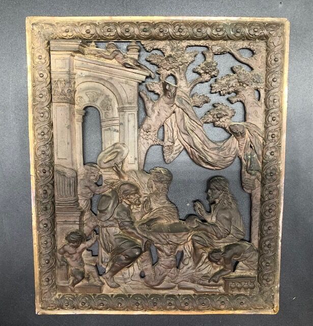 Null 基督生活的场景，两个镂空的铜牌，在一个交错的花框中。

18世纪初。

21 x 17 cm。

磨损的铜锈。