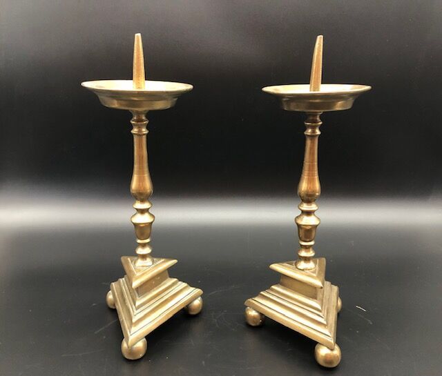 Null A pair of bronze pikers, triangular molded base, baluster-shaped shaft. 

L&hellip;