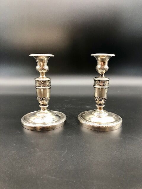 Null Pair of silver toilet candlesticks with laurel leaves decoration.

Punches &hellip;