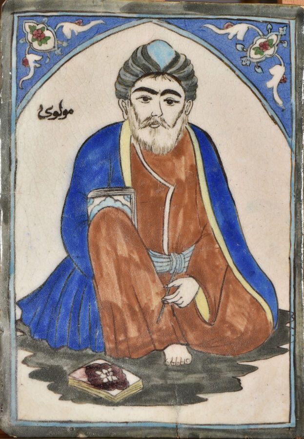 Null IRAN Kadjar 19世纪。

长方形陶瓷覆盖砖，有多色装饰，一个坐着的人，脚下有一本书，在一个椭圆形的框架内，有两个装饰有多叶曼陀罗的轴心，蓝&hellip;