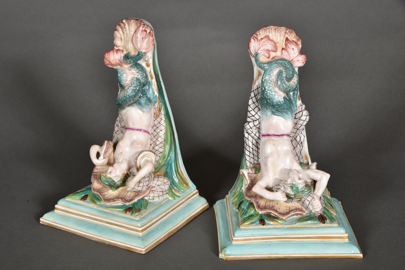 Null Pair of wall brackets in polychrome and gold porcelain representing a trito&hellip;
