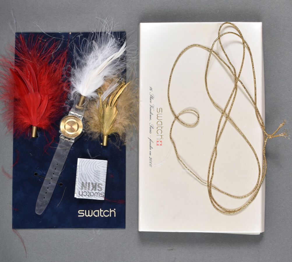Null Montre Swatch réf SFK136, modèle « Plume de fête» / spécial noël 2001, édit&hellip;