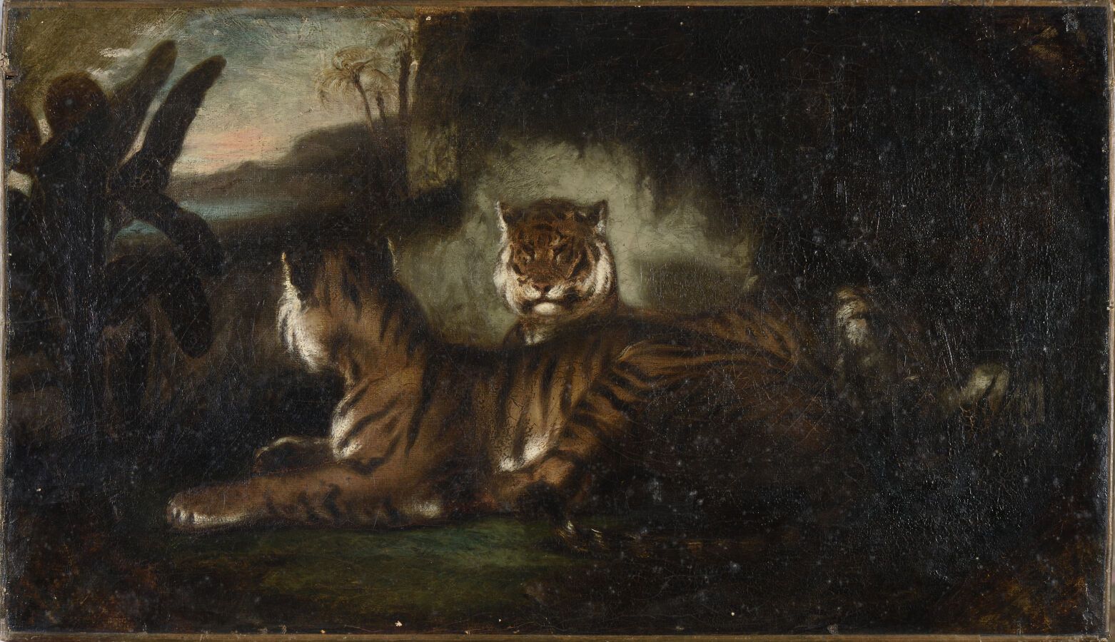 Null 19世纪法国学校 
景观背景下的一对老虎
布面油画（下部有小缝隙；旧清漆脏了）。 
H.47 - L. 81.4厘米 

鎏金木框架上有一个古老的刻字&hellip;