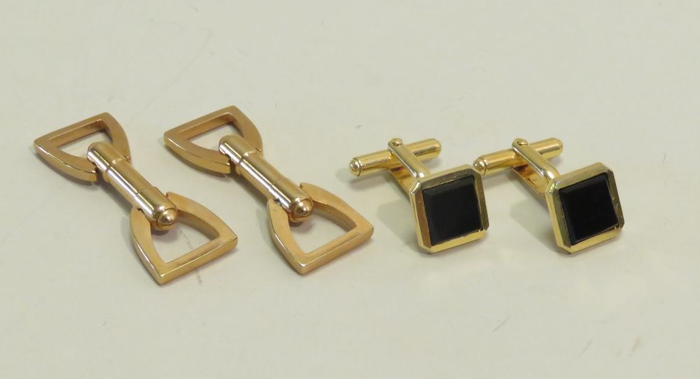 Null Set of two pairs of gilt metal cufflinks. In boxes.