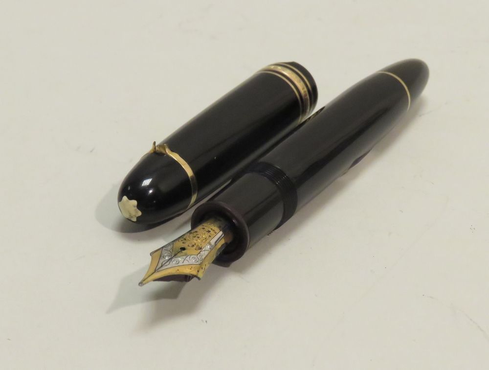 Null MONT-BLANC。美丽的钢笔（18K白金和黄金，编号：4810），"Meisterstuck N°149 "型号，黑色漆面树脂和黄金属性。长度：1&hellip;