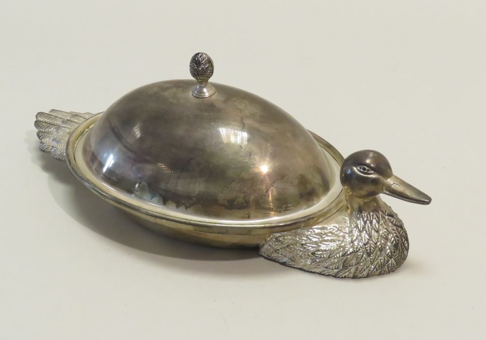 Null Silver plated metal vegetable dish, in the shape of a duck. The lid is a fl&hellip;