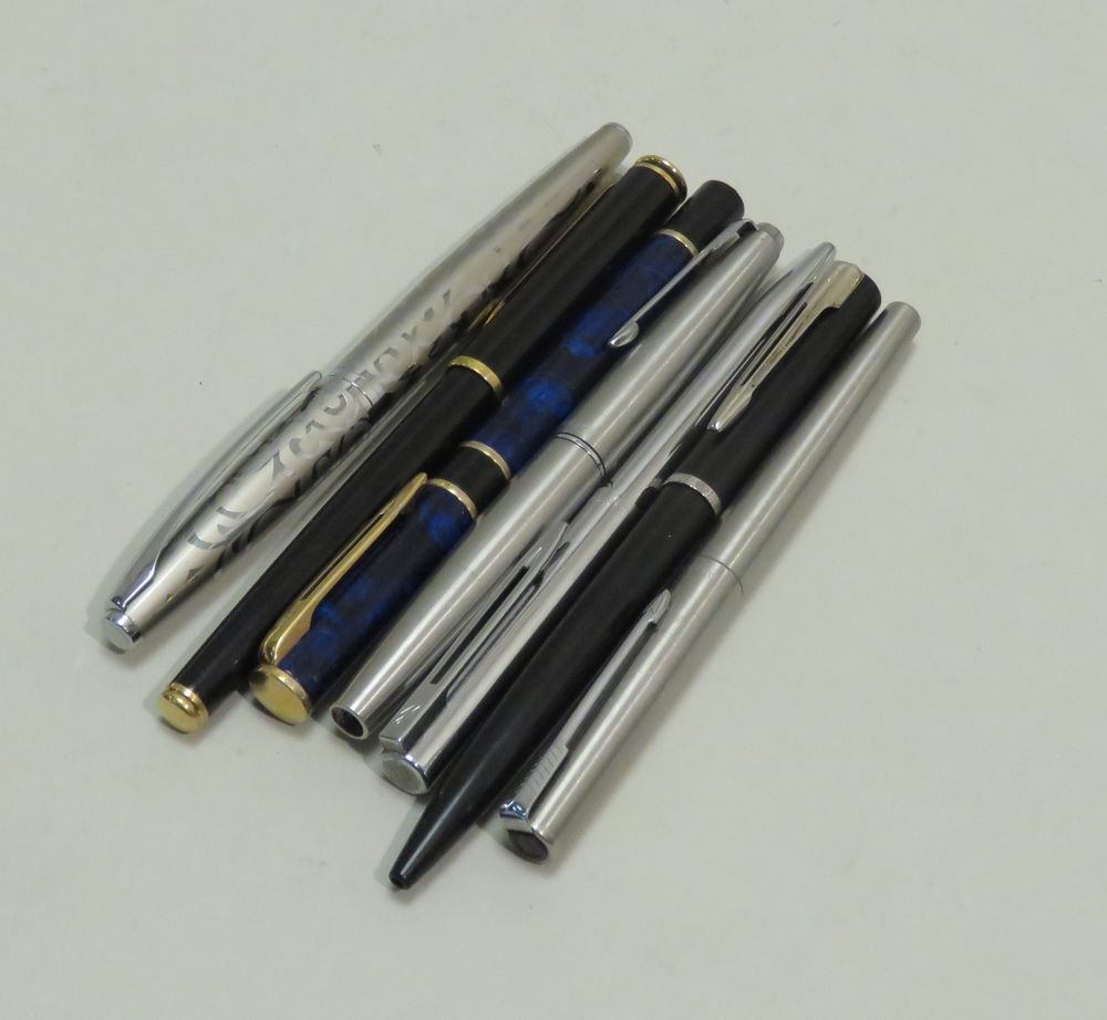 Null Lot de sept stylos divers (bille et plume) dont PARKER & WATERMAN. Lot en l&hellip;