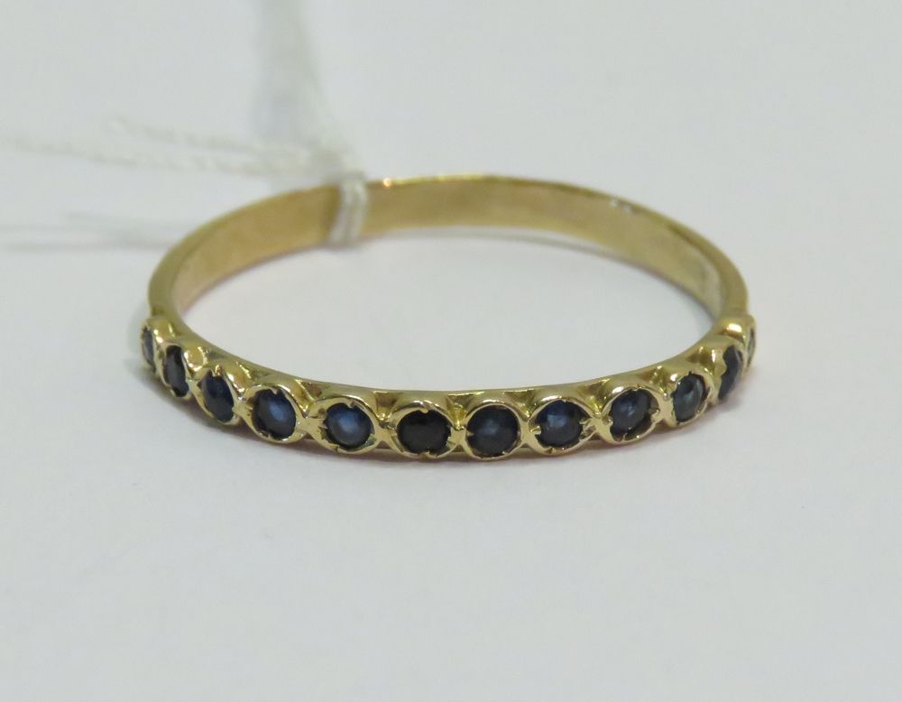 Null Yellow gold ring set with small brilliant blue stones. Gross weight: 1g55. &hellip;