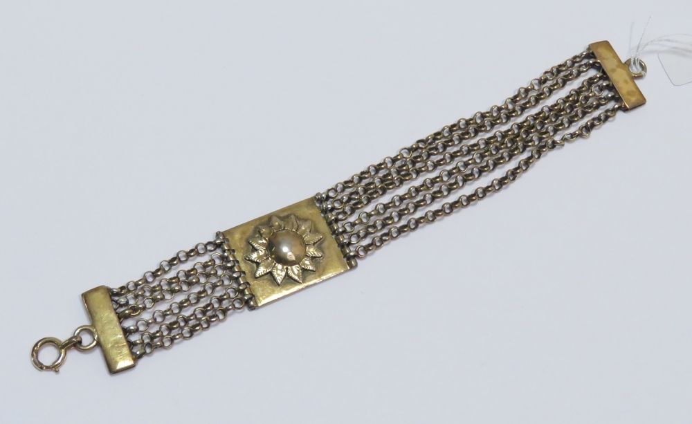 Null Bracelet "flowers" in silver slightly vermeiled. Weight : 33g45. Length: 20&hellip;