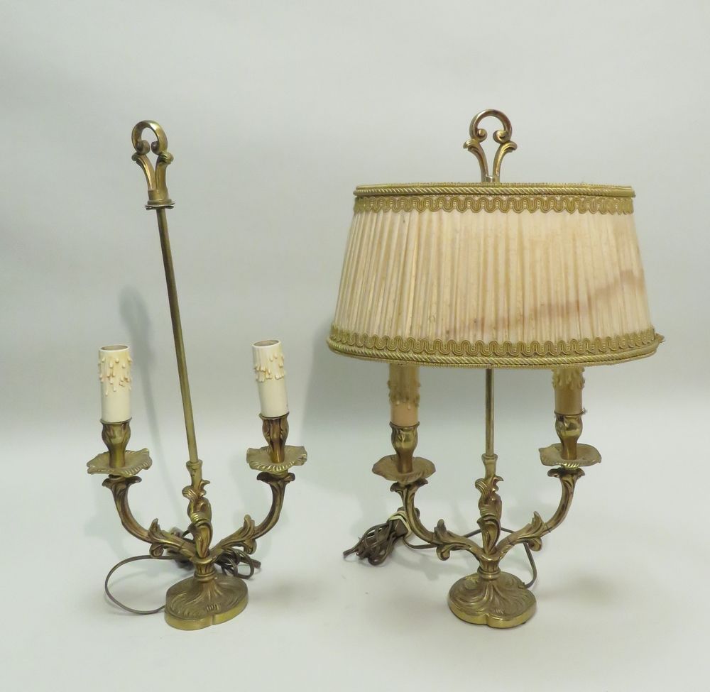 Null A pair of ormolu two-light bedside lamps with rocaille decoration. 20th cen&hellip;