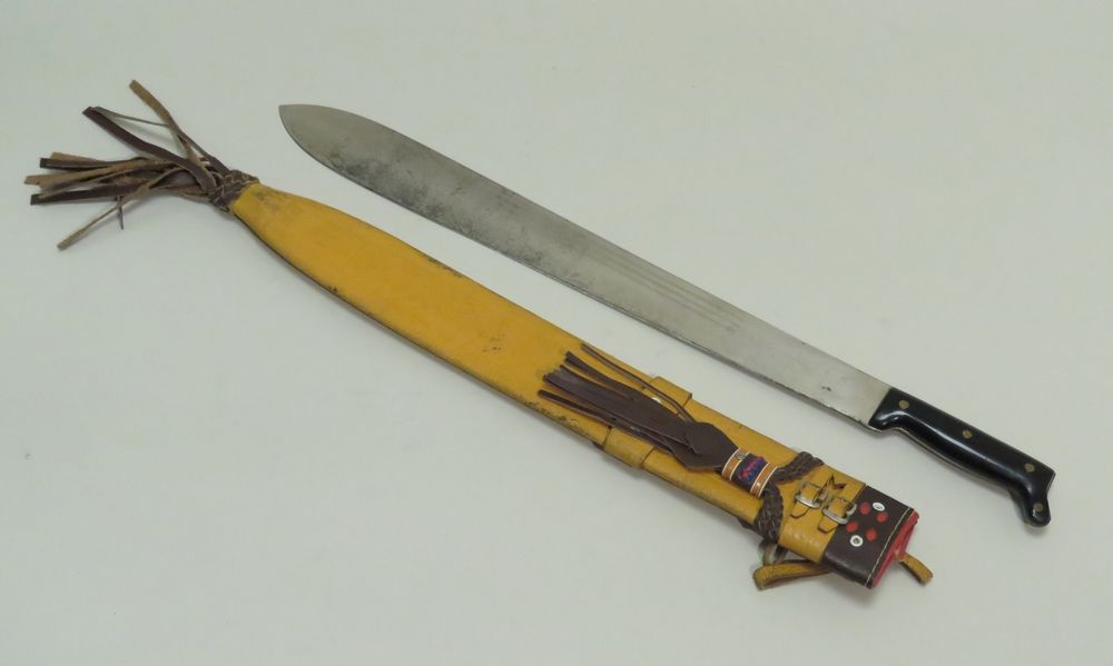 Null GARZA cutter with leather sheath. Long. Total length : 84 cm.