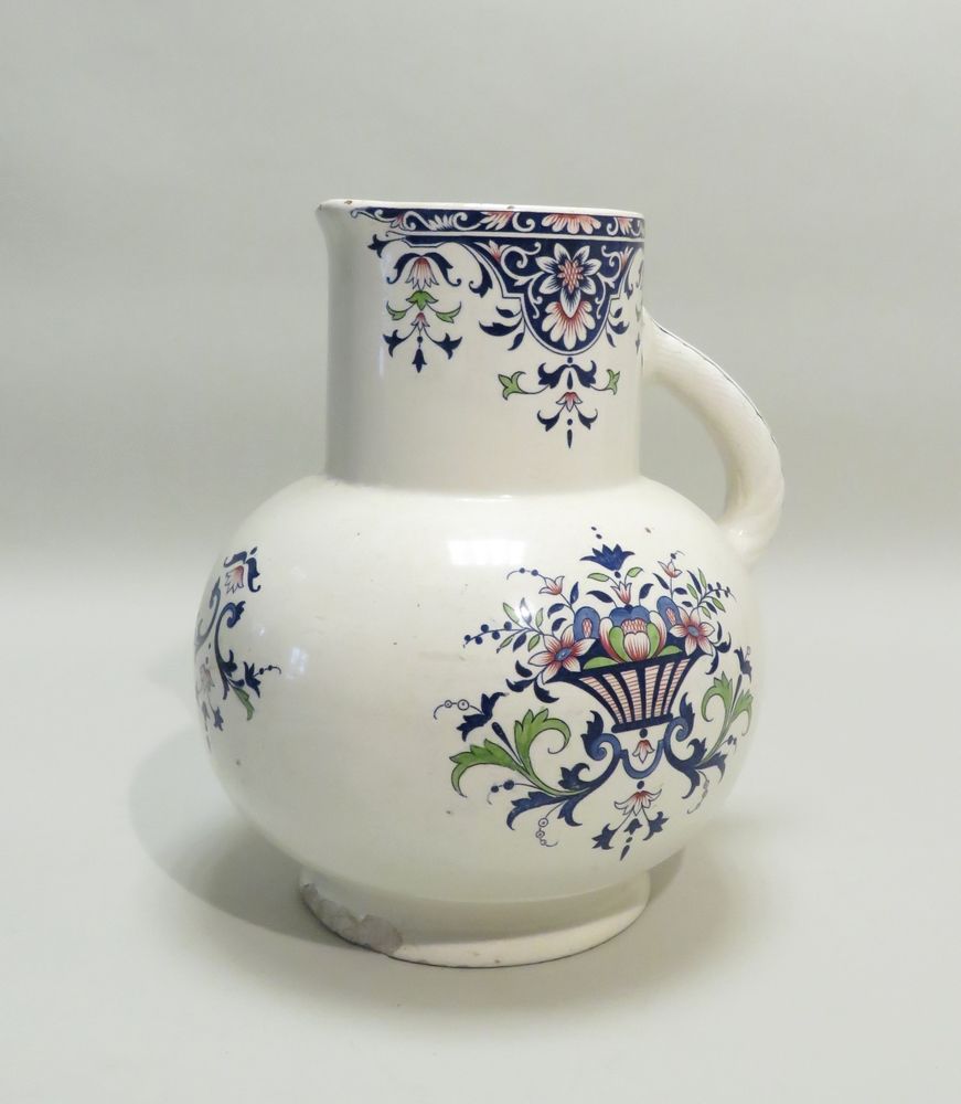 Null Earthenware jug decorated with flowering pots. Stamps in hollow under the b&hellip;