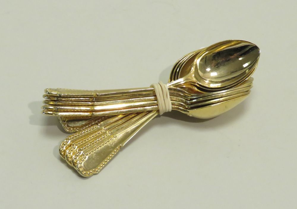 Null KREMA. Set of twelve gilt metal mocha spoons. Length : 11,5 cm