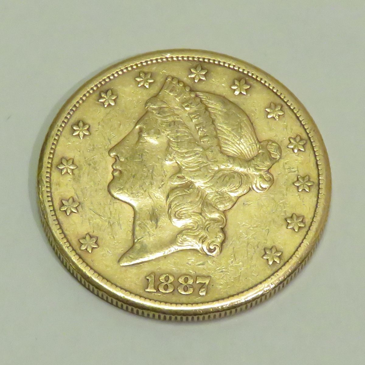 Null Pièce en or de 20 Dollars "Liberty Head-Double Eagle" datée de 1887, Atelie&hellip;