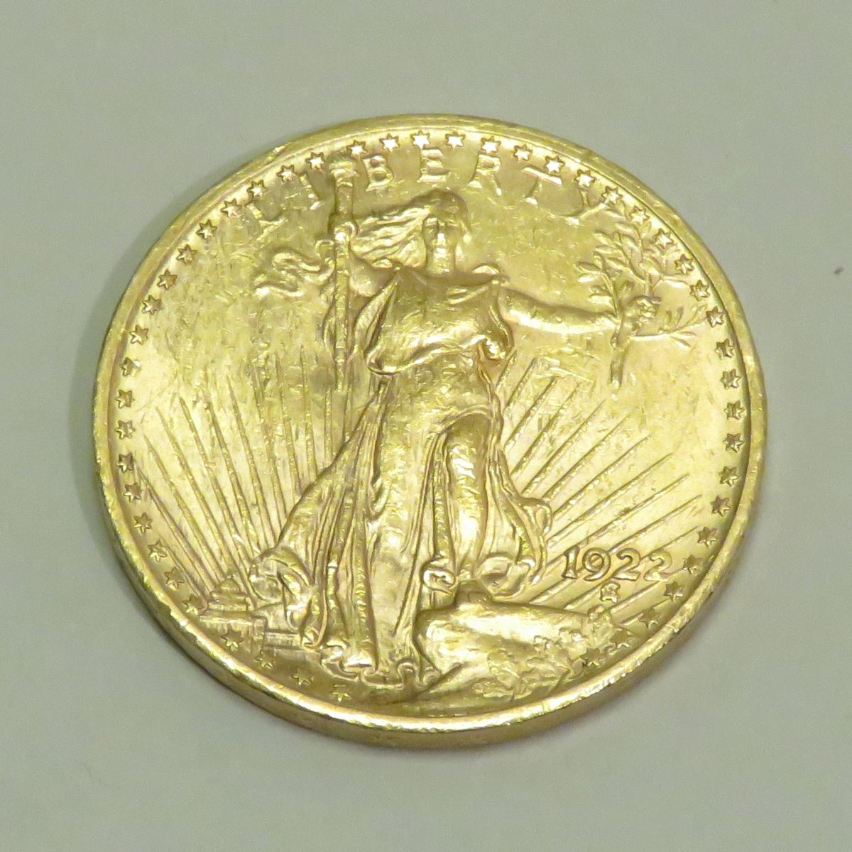 Null 20美元金币 "自由-圣-高登斯"，日期为1922年，雕刻师：奥古斯都-圣-高登斯。重量：33克45。直径：34mm。