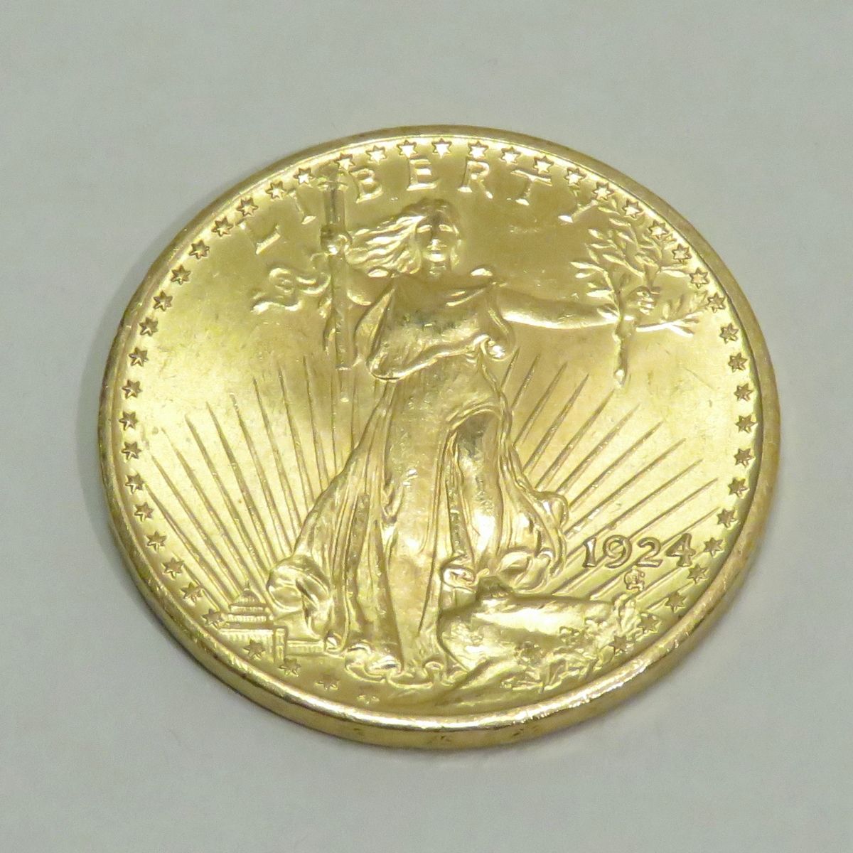 Null 20美元金币 "自由-圣-高登斯"，日期为1924年，雕刻师：奥古斯都-圣-高登斯。重量：33克45。直径：34毫米。