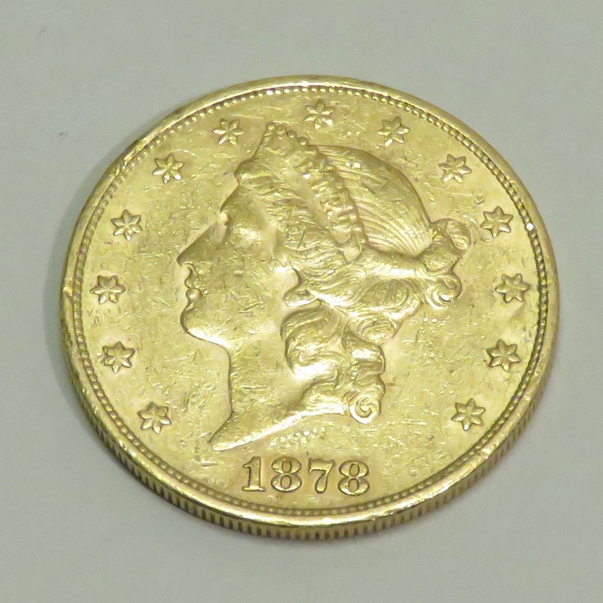 Null 20美元金币 "自由头-双鹰"，日期为1878年，工作室 "S"（旧金山），雕刻师：James B.朗克尔。重量：33克45。直径：34mm。
