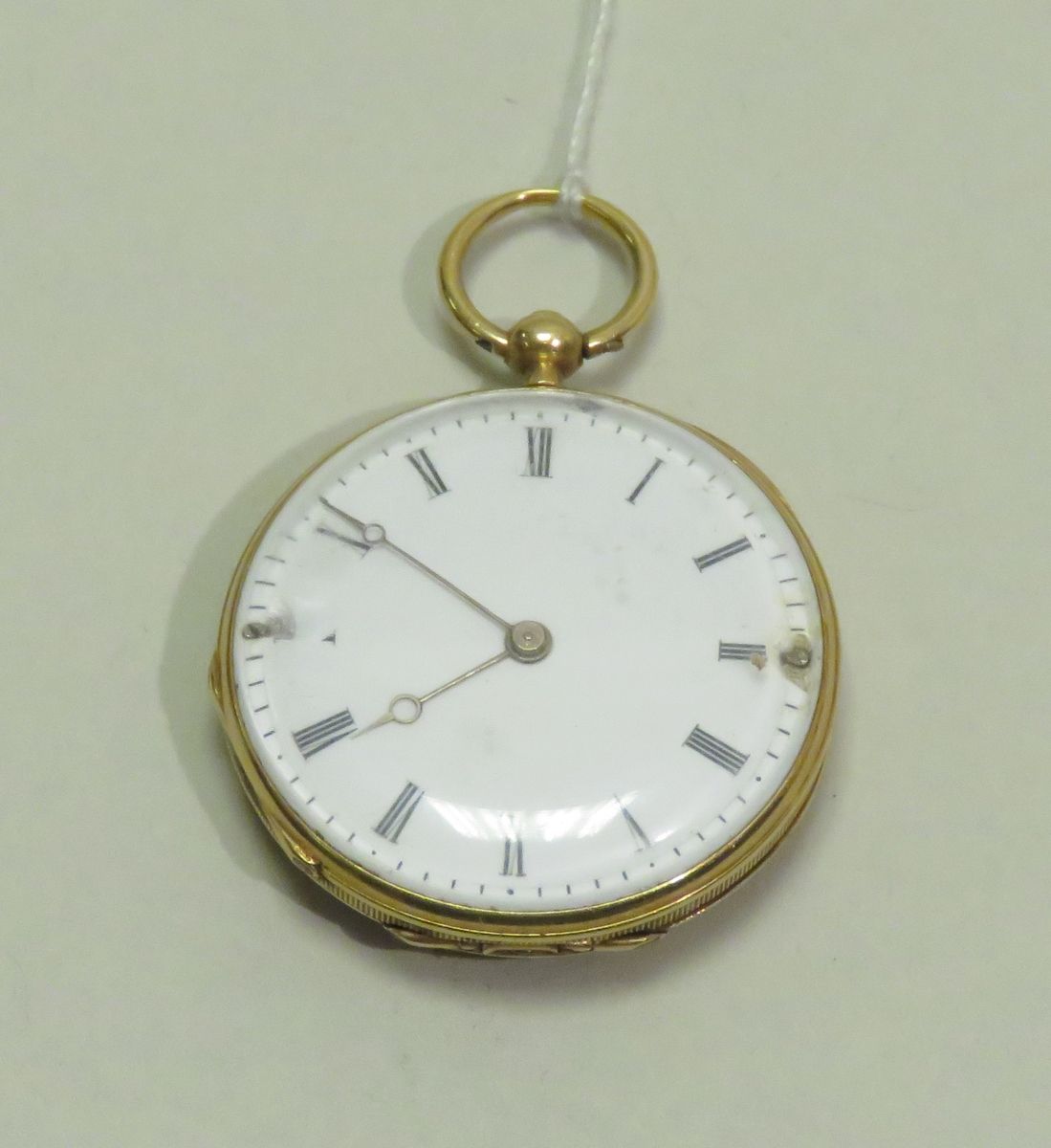 Null Gold and enamel collar watch. Gross weight: 17g65. (damaged).