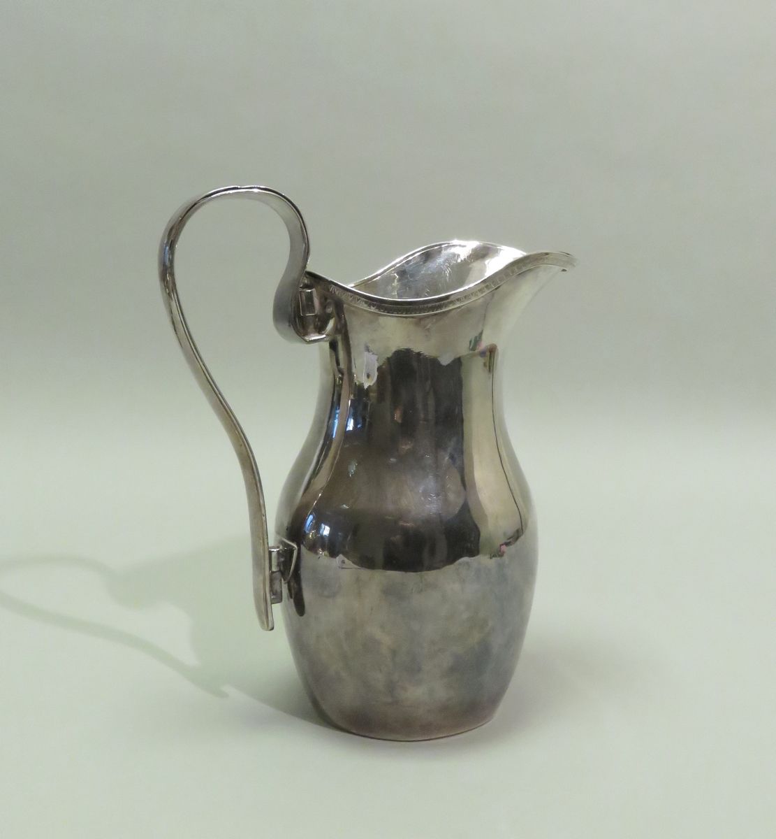 Null Silver pitcher (minimum title 800/1000) with plain body, the neck decorated&hellip;