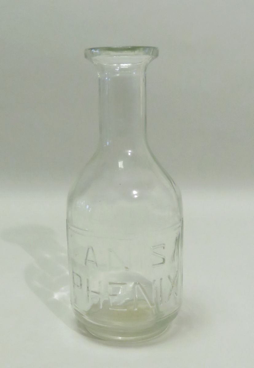 Carafe publicitaire en verre soufflé "Anis Phenix". 24.5 x 11 cm.
