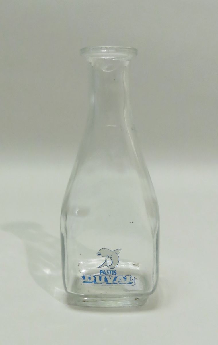 Null Carafe publicitaire en verre moulé/pressé "Pastis Duval". 16.5 x 6.5 cm.