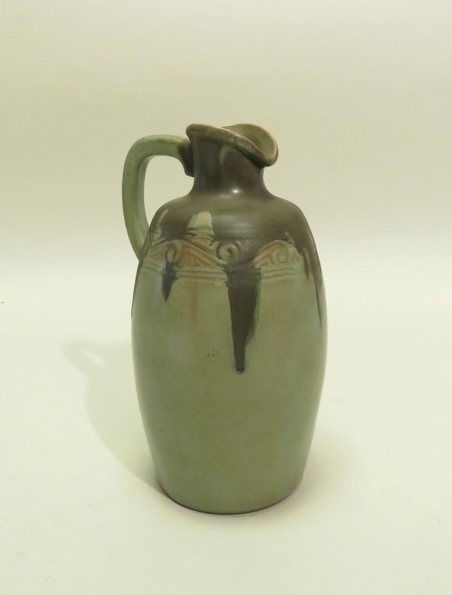 Pitcher in glazed stoneware with stylized volutes. Period ART DECO. 22 x 12.5 cm&hellip;
